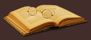 Open Book With Glasses